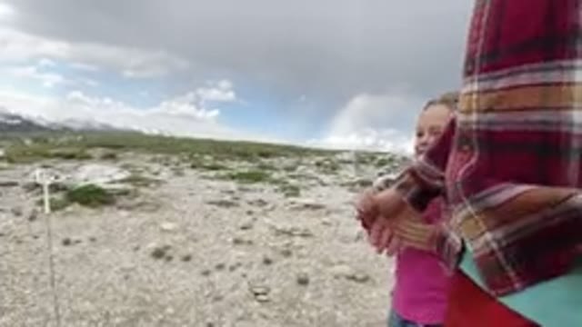WINTER PARK COLORADO-2019: An Adult Person Walking With A Blond-Haired Child In
