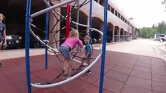 WINTER PARK COLORADO-2019: Children Playing On Playground Equipment