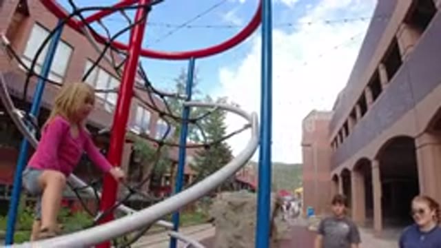 WINTER PARK COLORADO-2019: A Small Girl Playing On A Ride