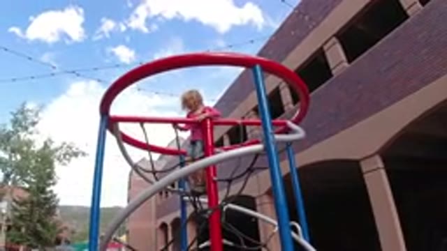 WINTER PARK COLORADO-2019: Little Girl Stops For A Look Around After Climbing To