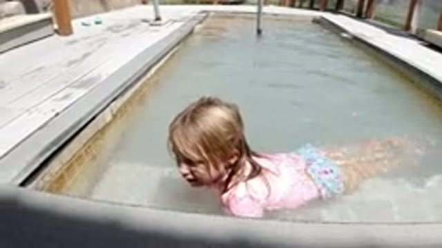 WINTER PARK COLORADO-2019: Little Girl Enjoys the Kiddie Pool in Winter Park