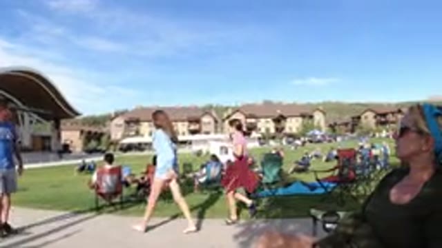 WINTER PARK COLORADO-2019: People Sitting On Chairs In Mountain Setting