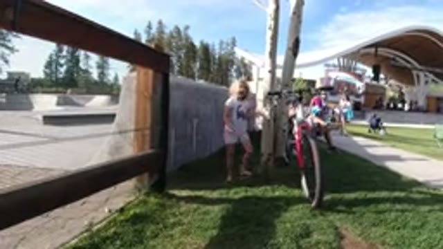 WINTER PARK COLORADO-2019: Child Girl Looking On Her Bicycle With Boys