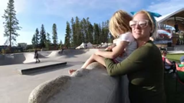 WINTER PARK COLORADO-2019: Mother And Daughter Enjoy Winter Fun On Bicycles And Skates