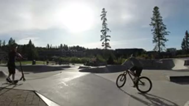 WINTER PARK COLORADO-2019: Kids Riding Bikes And Scooters In A Park