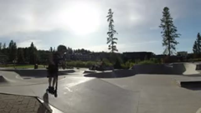 WINTER PARK COLORADO-2019: Kids Riding Scooters And Skateboards In A Skating Park