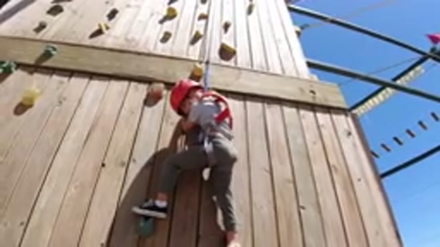 WINTER PARK COLORADO-2019: Don't Look Down Advice Ignored As Boy Climbs Rock
