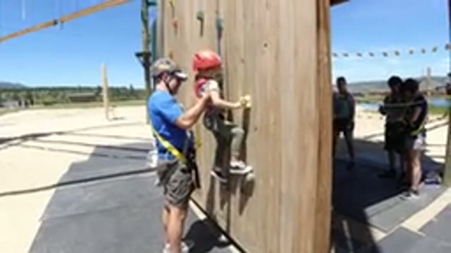 WINTER PARK COLORADO-2019: Garnet And Hold At An Outdoor Climbing Wall In The