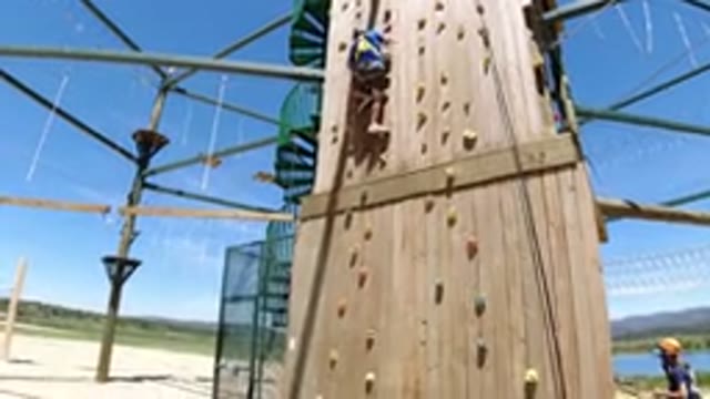 WINTER PARK COLORADO-2019: Man Abseiling On A Climbing Wall
