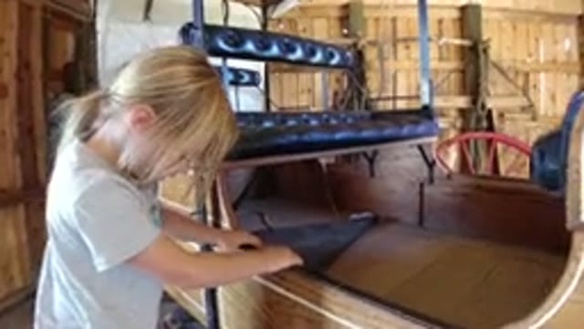 WINTER PARK COLORADO-2019: Blonde Child Playing in Cabin with Boat Chair