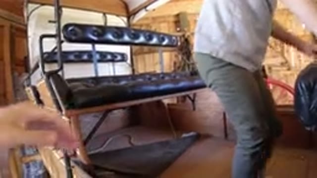 WINTER PARK COLORADO-2019: Little Child Playing On A Wooden Wrangler Triage With Parents