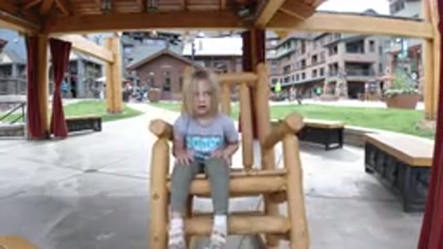 WINTER PARK COLORADO-2019: A Young Girl Playing in a Rocking Chair
