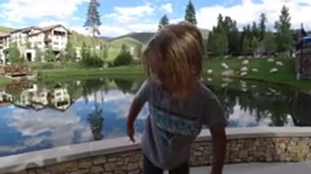 WINTER PARK COLORADO-2019: A Small Girl Standing On The Table Outdoors Near