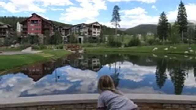 WINTER PARK COLORADO-2019: A Blonde Girl Gets Up From The Floor While Looking At