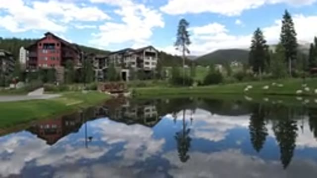 WINTER PARK COLORADO-2019: Nature Village Pond Clearly Reflects Surrounding