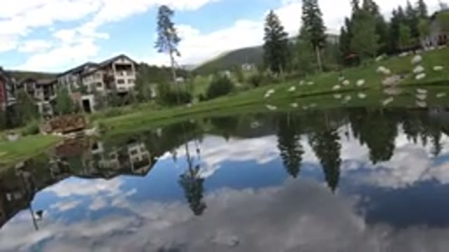 WINTER PARK COLORADO-2019: A Water Area With Other Side Of The Buildings Visible