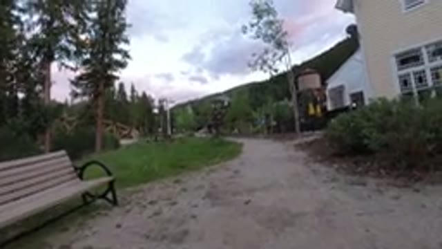 WINTER PARK COLORADO-2019: Persons Point Of View Walking On A Path To House