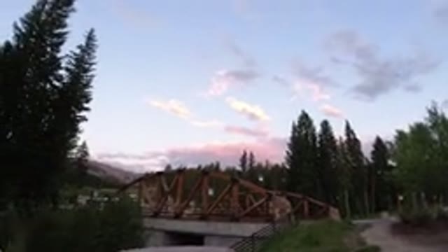 WINTER PARK COLORADO-2019: A View Of A Small Bridge Surrounded With Tall Trees