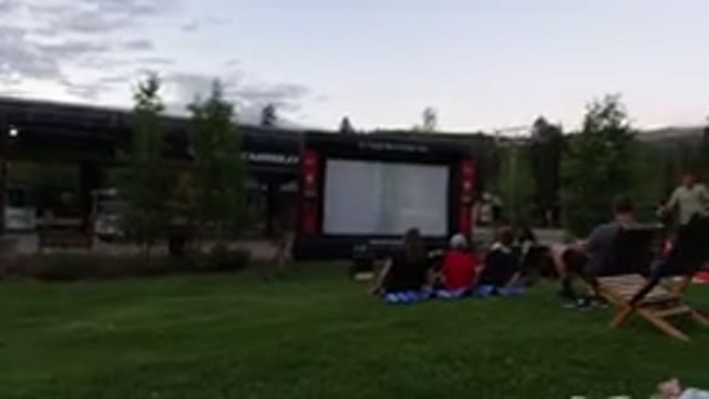 WINTER PARK COLORADO-2019: People In A Group Relaxing Viewing Of A Movie At A