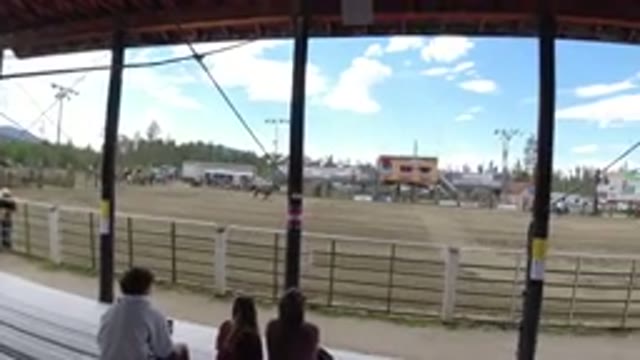 WINTER PARK COLORADO-2019: People Sitting In The Stands Watching A Person Ride A Horse