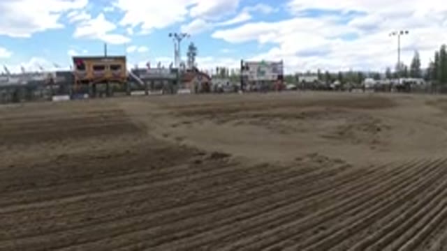 WINTER PARK COLORADO-2019: View Of A Large Dirt Field With Some Buildings On The Horizon