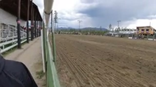 WINTER PARK COLORADO-2019: People On The Side Of A Gated Horse Track Waiting