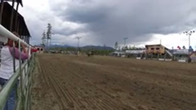 WINTER PARK COLORADO-2019: Horses Riding Down A Dirt Track On A Nice Sunny Day