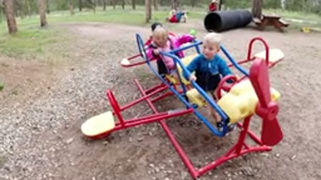 WINTER PARK COLORADO-2019: Cute Kids Enjoying And Playing On Seesaw At Local