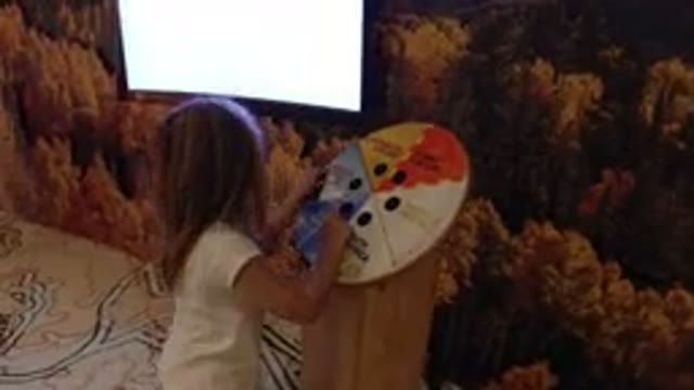WHEAT RIDGE COLORADO-2019: Young Girl Playing With Interactive Display At A
