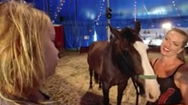 BROOMFIELD COLORADO-2019: Girl Talking To Circus Lady In The Circus While She