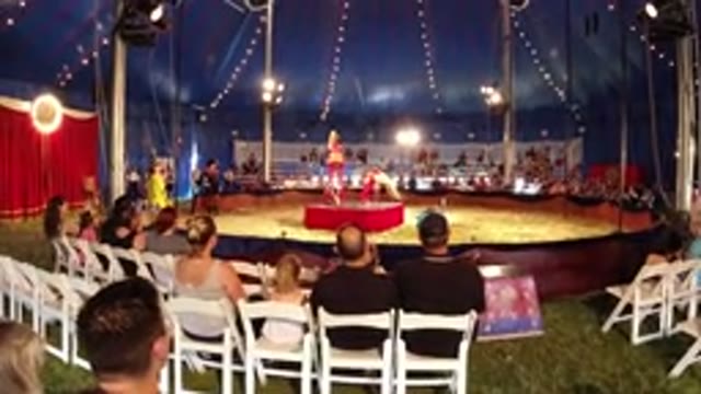 BROOMFIELD COLORADO-2019: Dancers Wearing Pink Dresses Performing In Front Of A Tent