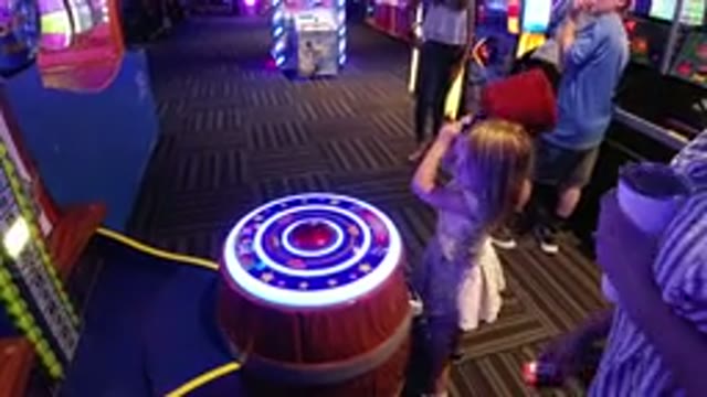 BROOMFIELD COLORADO-2019: Girl And Mother Playing Hammer Whacking Game In Arcade