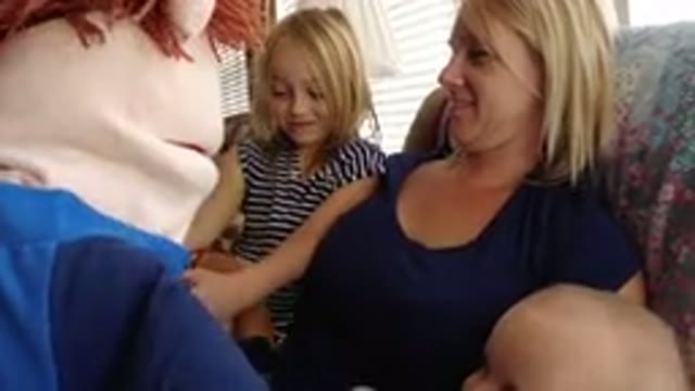 BROOMFIELD COLORADO-2019: Tired Mother With Baby And Child Watching Home Puppet