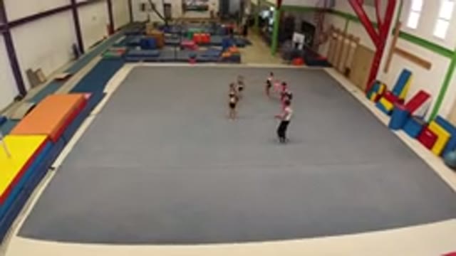 LOS CABOS MEXICO-2019: A Young Girl Performs Gymnastics on a Balance Beam
