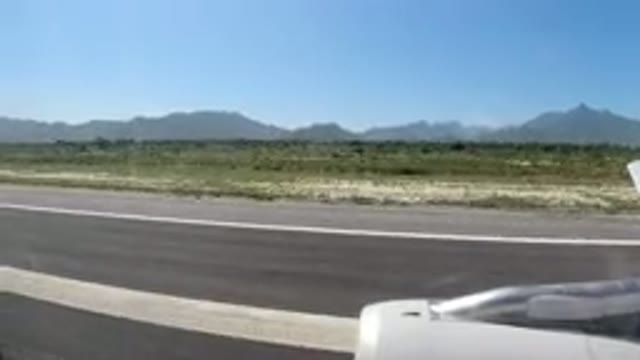 LOS CABOS MEXICO-2019: View Out Of Airplane Window As It Taxi Down Runway
