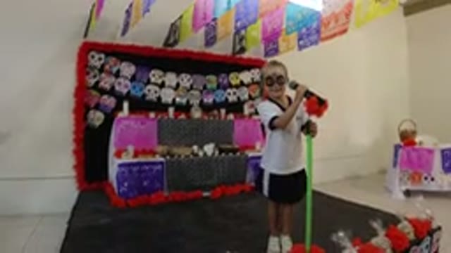 LOS CABOS MEXICO-2019: Little Boy Playing in a Stall with Face Paint
