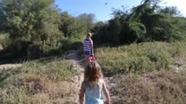 LOS CABOS MEXICO-2019: Mother Daughter Walking Enjoying Greenery Surrounded