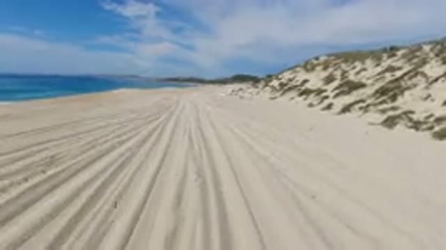 LOS CABOS MEXICO-2019: Sand Water Rocks Clouds Sky