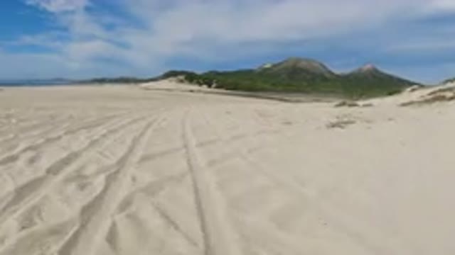 LOS CABOS MEXICO-2019: Peacefully Driving Through The Desert Admiring The Mountains And Sky