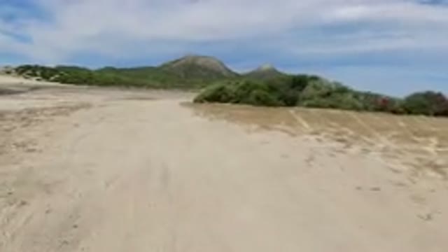 LOS CABOS MEXICO-2019: Dirt Mountains Green Bike Activity Fun Beautiful Grass