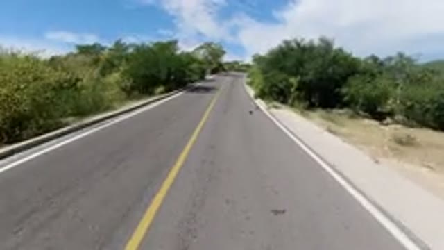 LOS CABOS MEXICO-2019: View From A Vehicle Traveling Rapidly On A Paved Street