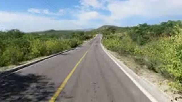 LOS CABOS MEXICO-2019: Easy Clean Single Road Track With Plants And Trees Around