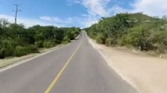 LOS CABOS MEXICO-2019: View Of A Highway From A Dash-cam On The Front Screen Of