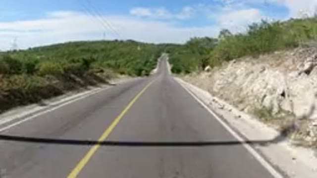 LOS CABOS MEXICO-2019: Going Down Highway Alone Surrounded By Trees