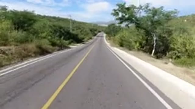 LOS CABOS MEXICO-2019: Moving Down The Road With Greenery On The Roadside During