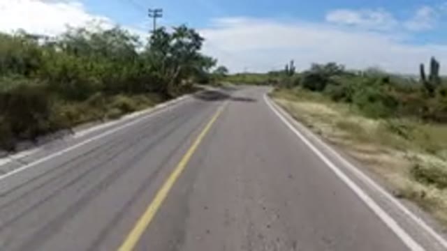 LOS CABOS MEXICO-2019: Going Through A Long Narrow Road On A Sunny Cloudy Day