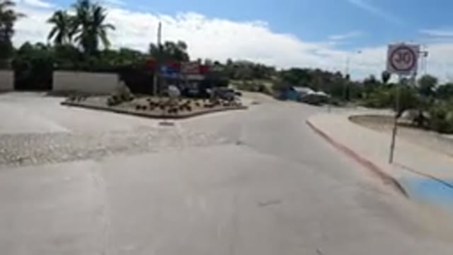 LOS CABOS MEXICO-2019: Driving Through A Neighborhood In Desert Landscape With