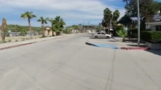 LOS CABOS MEXICO-2019: Traveling By Wranglers On Street By Palm Trees And Lake