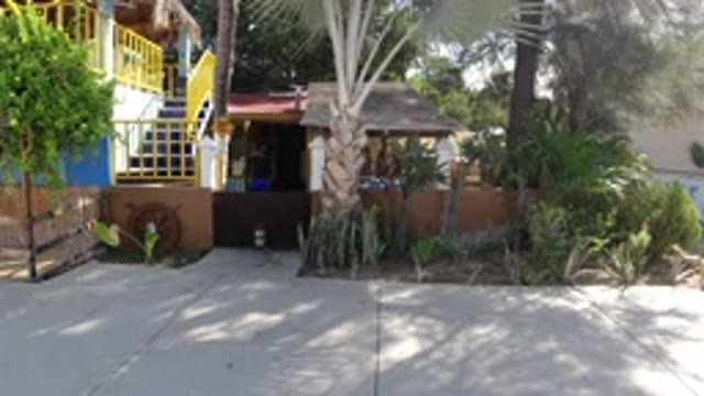 LOS CABOS MEXICO-2019: View From The Street Of A Specific Building With A Few