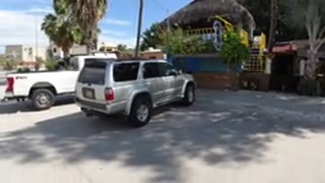 LOS CABOS MEXICO-2019: A Wrangler Is Parking In Front Of The Building